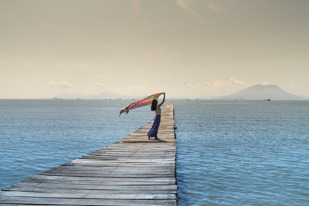 women, jetty, sea, shawl, nature, pier, sky, ocean, outdoors